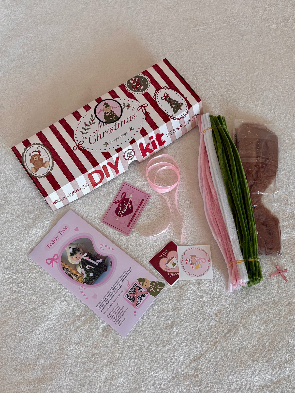Materials included in the teddy bear Christmas tree DIY pipe cleaner kit
